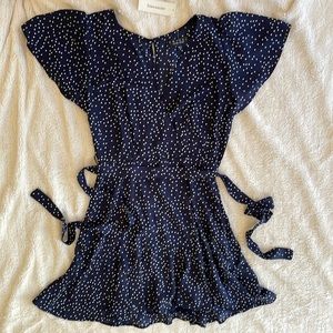 S trixxi from Francesca’s polka dot navy short sleeve mini dress